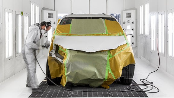 Collision Center Technician Painting a Vehicle | Steet Toyota of Yorkville in Yorkville NY