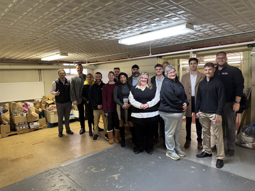Steet Ponte Auto Group employees donating food donations to the Thea Bowman House in Utica, NY