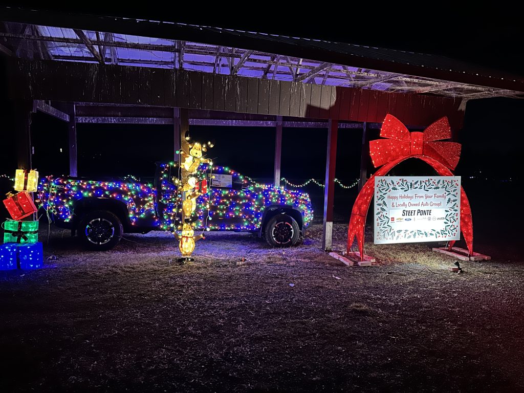 Toyota Tacoma wrapped in lights for the Lights Around the Park Light Show at the Kirkland NY Town Park hosted by the Clinton Fire Department