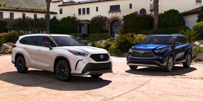 Image of two Toyota Highlander SUVs
