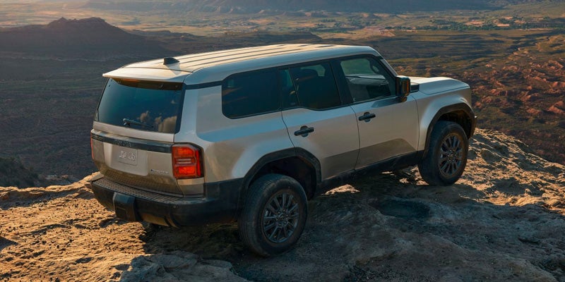 Image of a 2024 Land Cruiser parked on a cliff